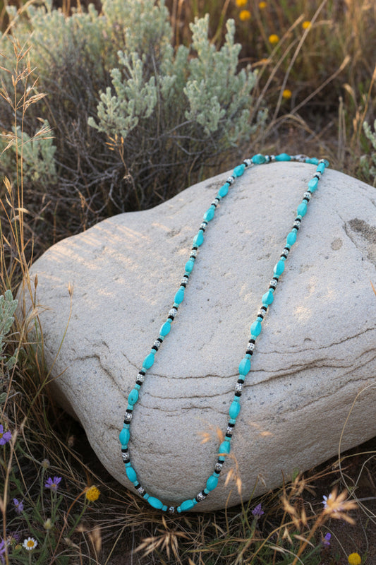 Turquoise Colored Twisted Barrel Bead Necklace with Floral Accents